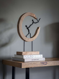 Sculpture On Wooden Stand