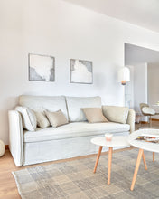 Load image into Gallery viewer, Tanit sofa bed in white with natural finish solid beech wood legs, 210 cm FSC Mix Credit - image 12