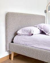 Load image into Gallery viewer, Dyla bed in light grey bouclé, with solid beech wood legs for a 160 x 200 cm mattress - image 5