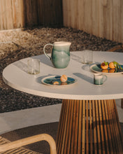 Load image into Gallery viewer, Alcaufar round outdoor table made of solid teak wood and white cement Ø 90 cm - image 4