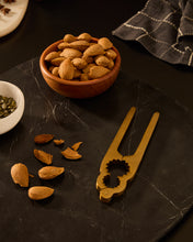 Load image into Gallery viewer, Blisk nutcracker made of gold-coloured stainless steel