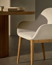 Load image into Gallery viewer, Konna chair in beige with solid ash wood legs in a natural finish - image 10