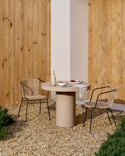 Load image into Gallery viewer, Eltiera stackable chair in synthetic rattan with black steel frame and armrests - image 11