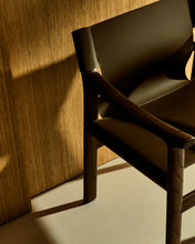Load image into Gallery viewer, Jan chair made of dark brown recycled leather fibres and FSC 100% solid ash wood with walnut-coloured finish - image 6