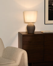 Load image into Gallery viewer, Viona large table lamp with textured stone effect and cotton lampshade UK adapter - image 2