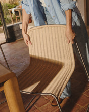 Load image into Gallery viewer, Tavari stackable chair in beige synthetic rope cord and AISI 304 stainless steel with brushed finish - image 6