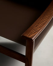 Load image into Gallery viewer, Jan armchair made of dark brown recycled leather fibres and FSC 100% solid ash wood with walnut-coloured finish - image 14