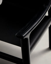 Load image into Gallery viewer, Jan chair made of black recycled leather fibres and FSC 100% solid ash wood with black finish - image 10