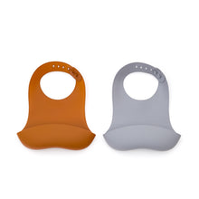 Load image into Gallery viewer, Lili set of two bibs in orange and blue silicone