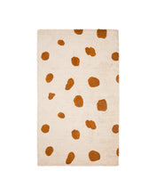 Load image into Gallery viewer, Tandani beige cotton rug with orange cheetah design 90 x 150cm