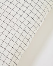Load image into Gallery viewer, Maialen 100% linen cushion cover with white squares and black grid 45 x 45 cm - image 2