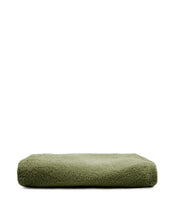 Load image into Gallery viewer, Kaeli footrest cover in green bouclé Ø 43 cm