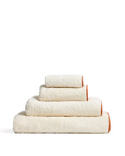 Load image into Gallery viewer, Sedora 100% cotton towel with orange contrast detail 70 x 140cm - image 2